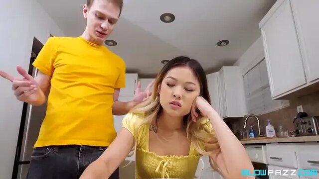 Asian teen slobbers on cock hard