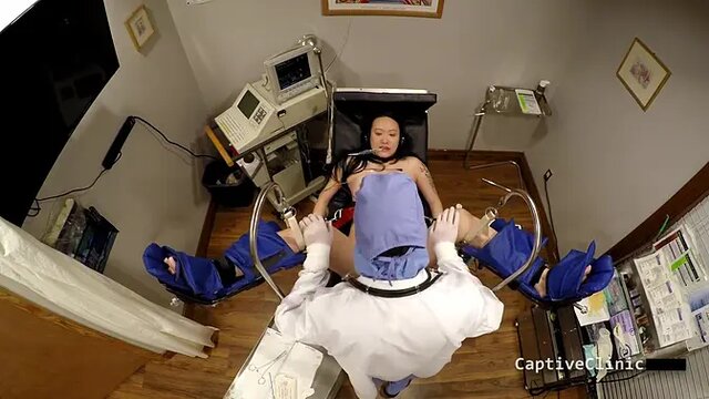 Black-haired Asian beauty gets a degrading handjob and ass spread