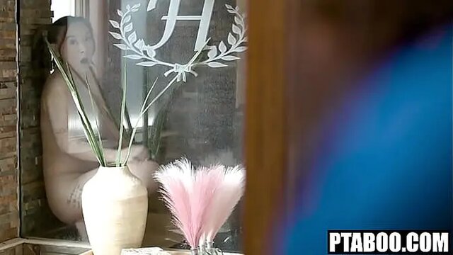 Teen cheerleader caught in shower rubbing her pussy