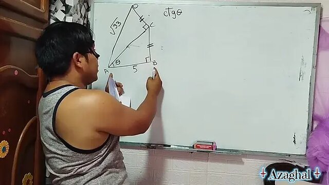 Asian teacher fucks her nerdy student in the classroom