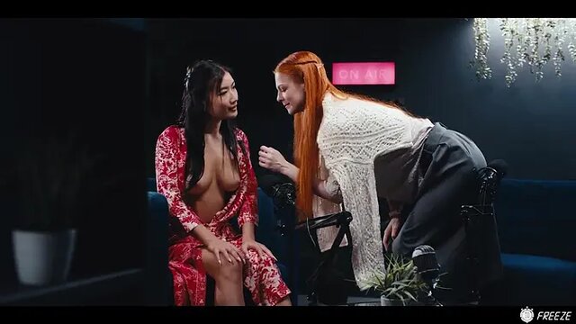 Brunette redhead humiliates Asian submissive in lesbian hardcore